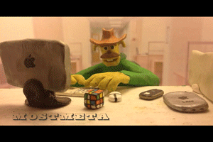 Claymation character at his desk, wearing a cowboy hat, pointing to the viewer with the caption, I'm not looking for a job at the moment, but lets keep in touch in case I get canned
